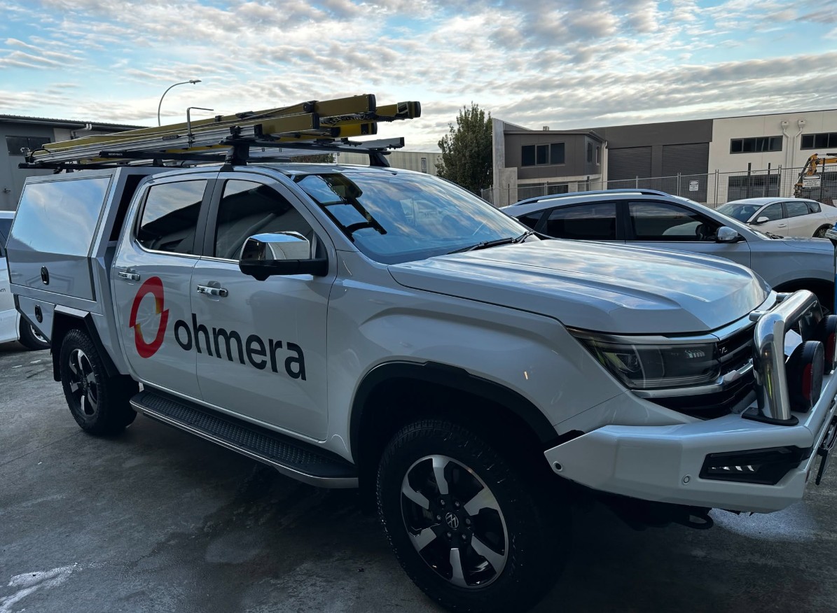 White Volkswagen Amarok work ute with canopy detailed on site
