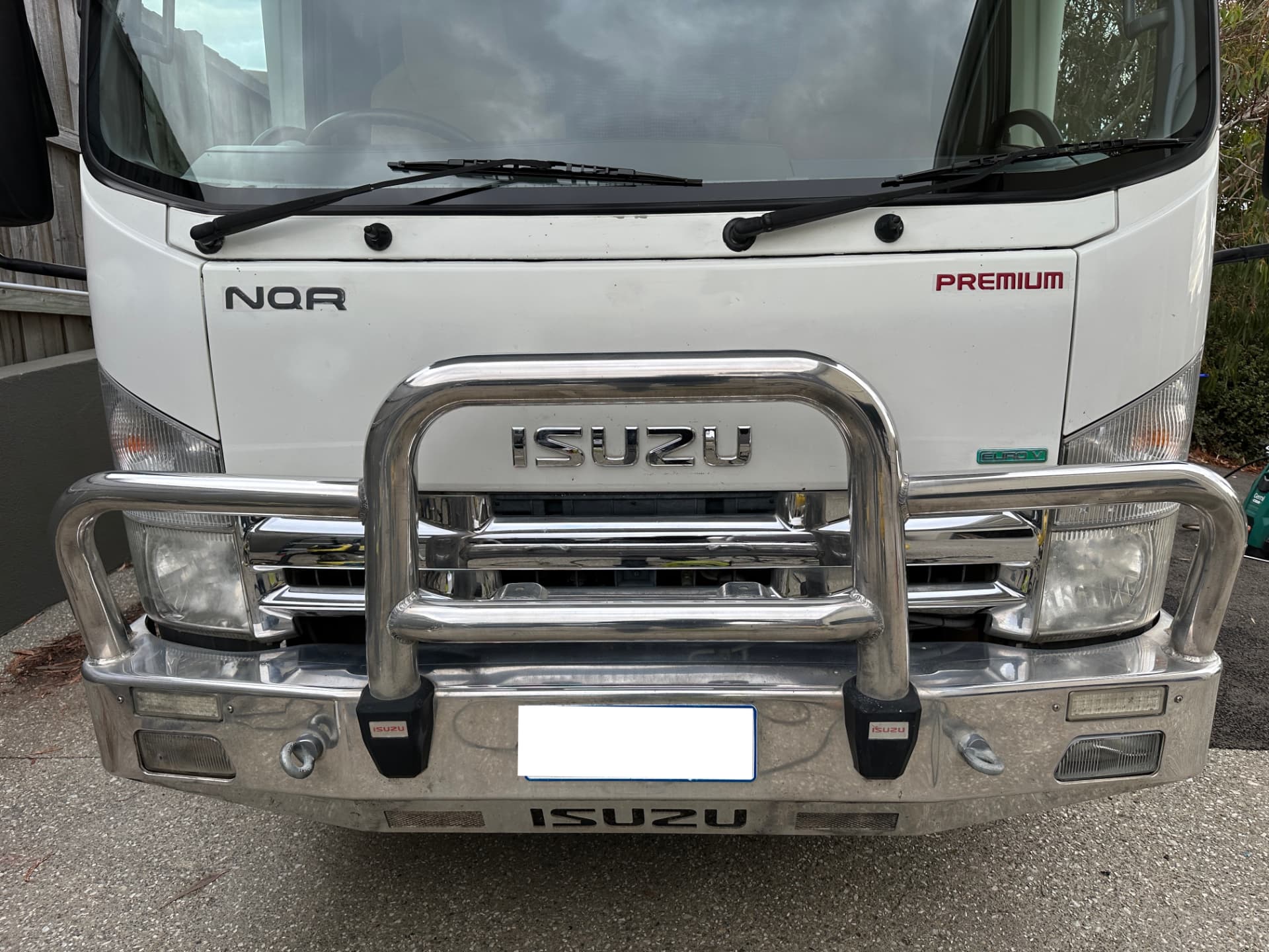 After — Isuzu NQR truck bull bar before and after a metal polish restoration