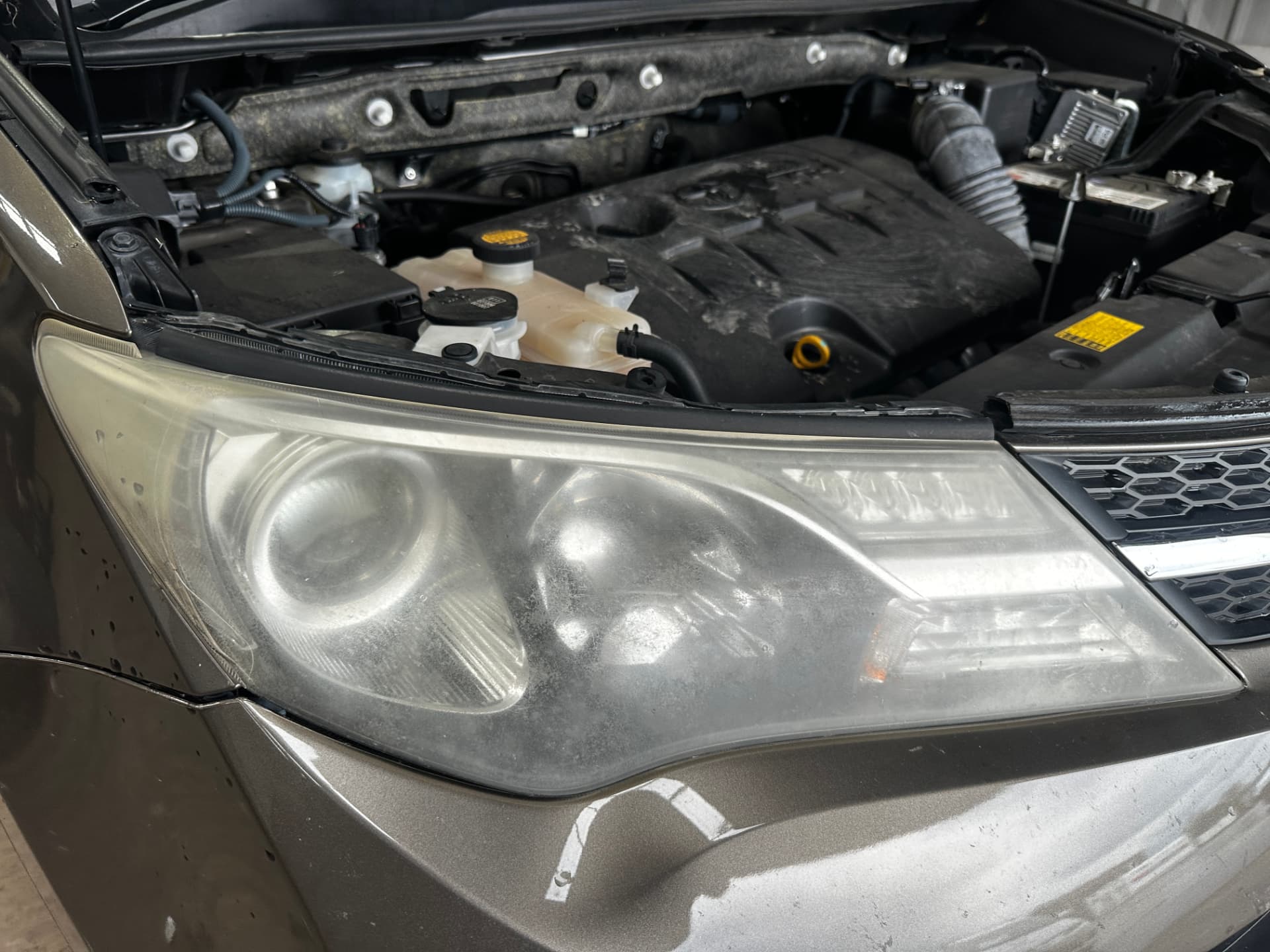 Before — Toyota RAV4 headlight before and after restoration