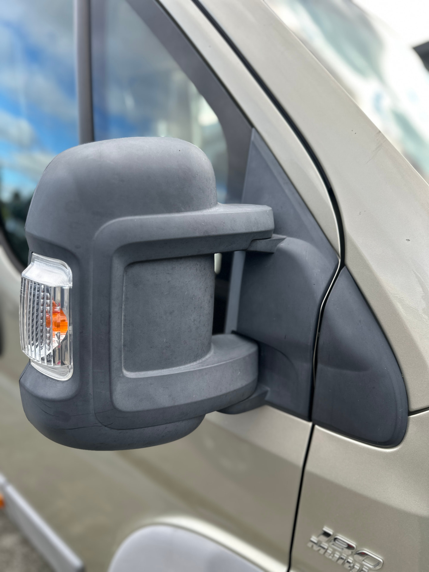 Before — Fiat Ducato mirror housing before and after plastic trim restoration