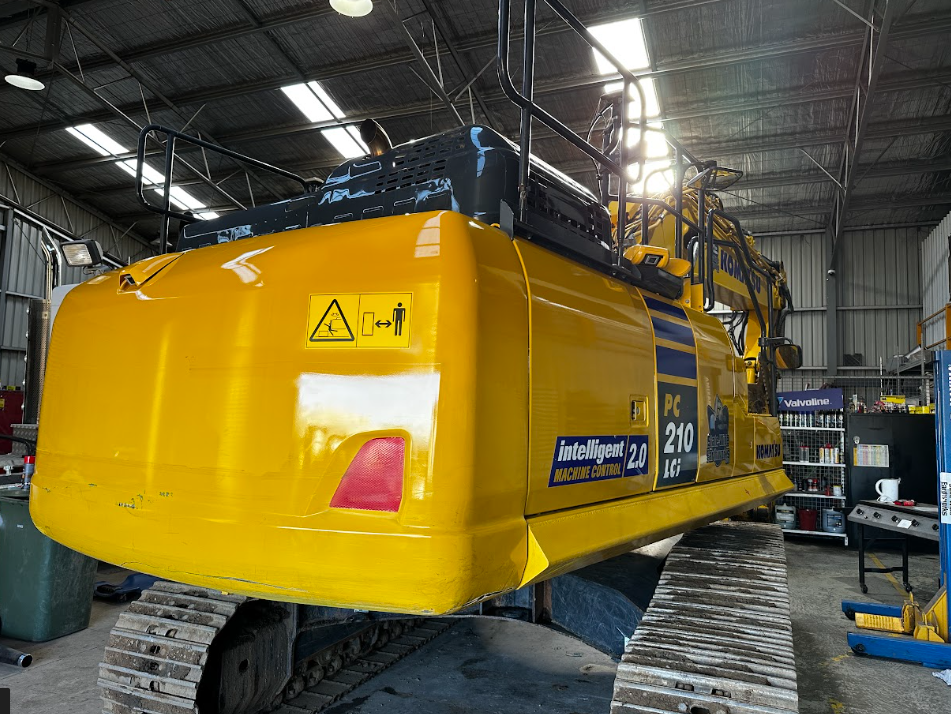 Komatsu excavator cleaned and restored in the workshop