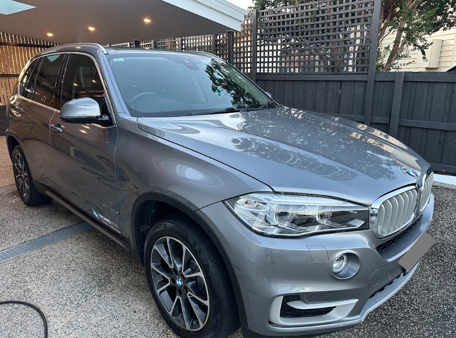 Grey BMW X5 detailed at a Hobart home