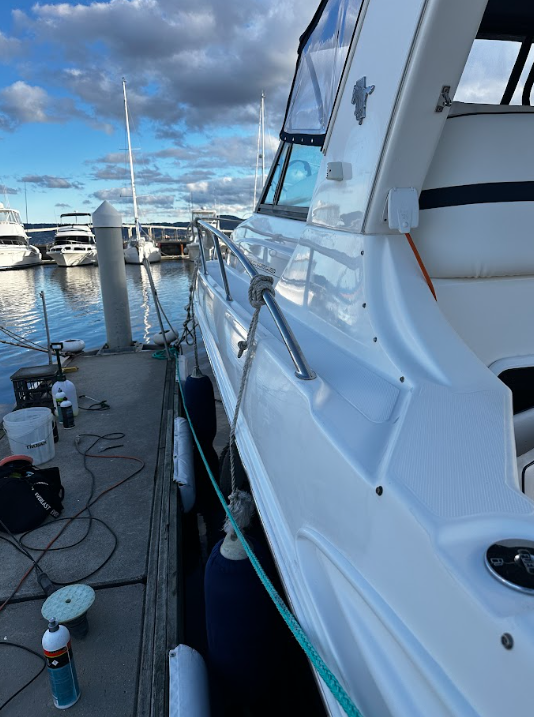After — Boat & Marine Detailing — Boat hull before and after professional marine detailing