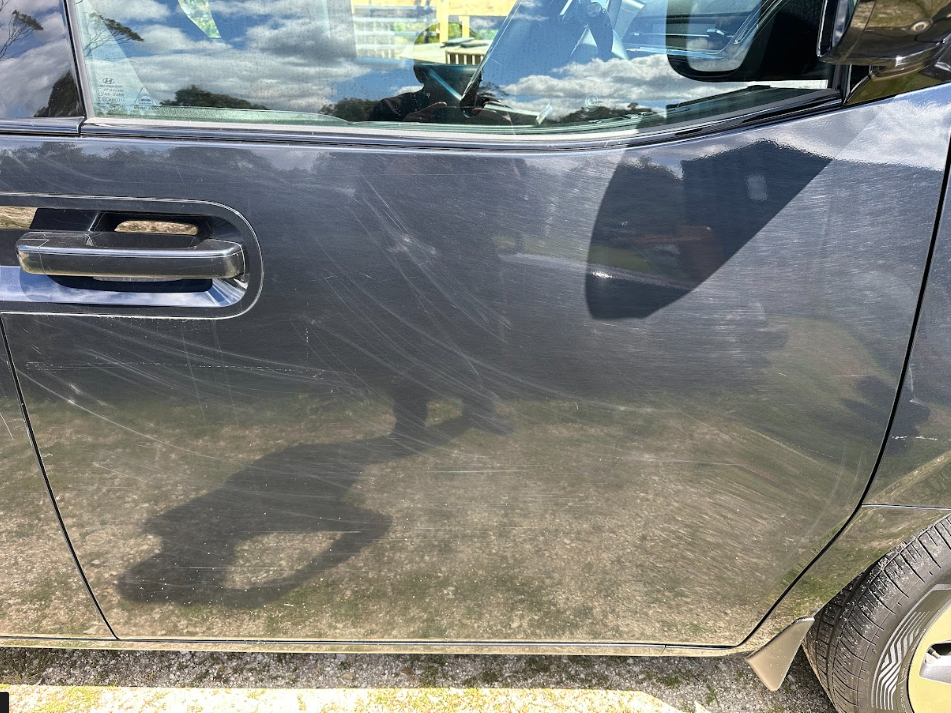 Before — Scratched and swirled door panel before and after a cut and polish