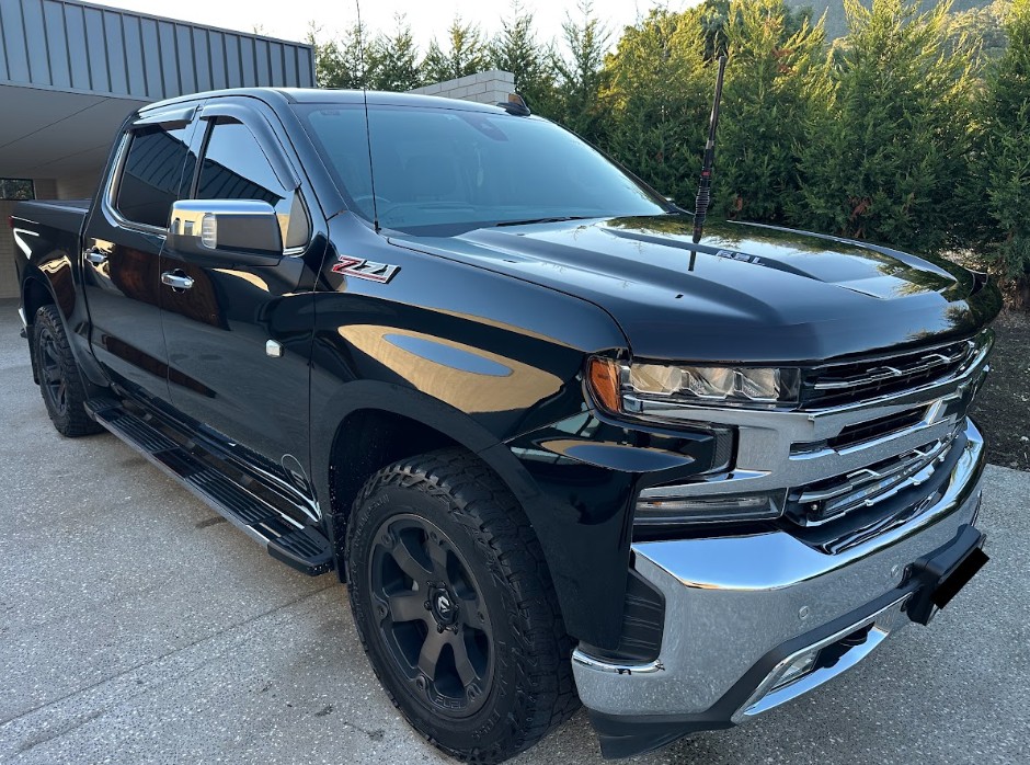 Black Chevrolet Silverado detailed to a deep gloss