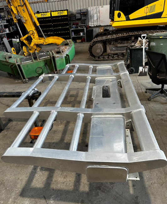 Before — Truck bullbar before and after a mirror metal polish