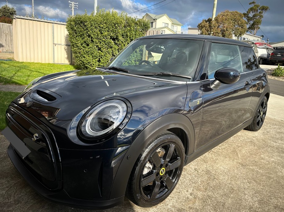 Black Mini Cooper S hatchback polished to a deep gloss