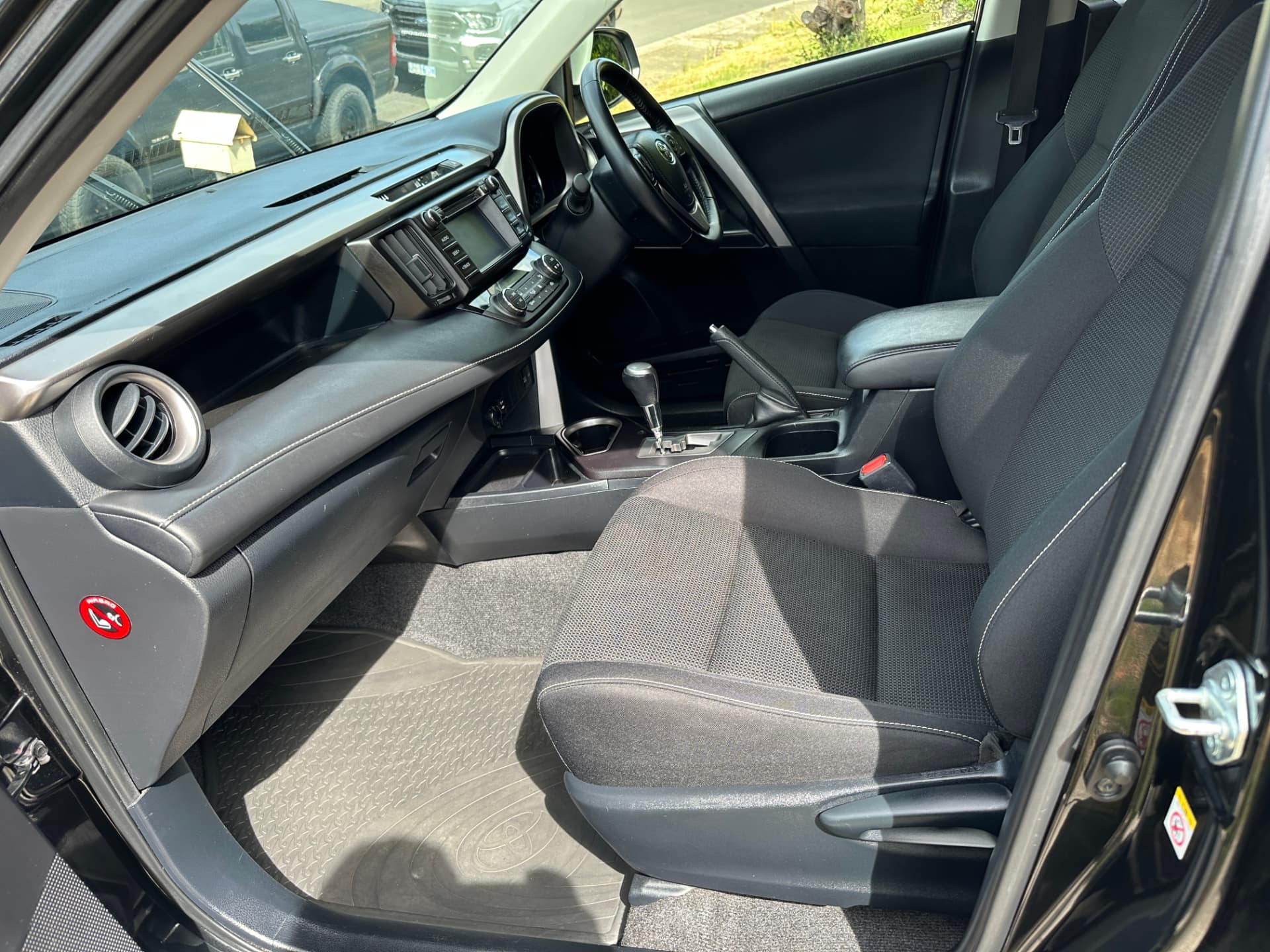 After — Toyota RAV4 front cabin before and after an interior detail