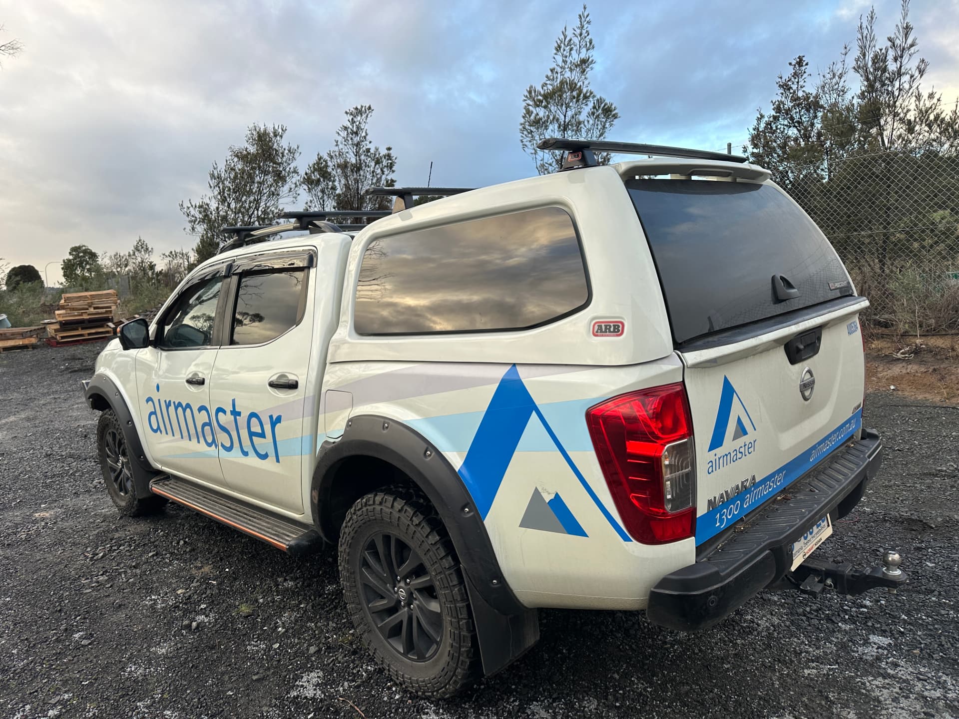 Before — Nissan Navara before and after full company signage and decal removal