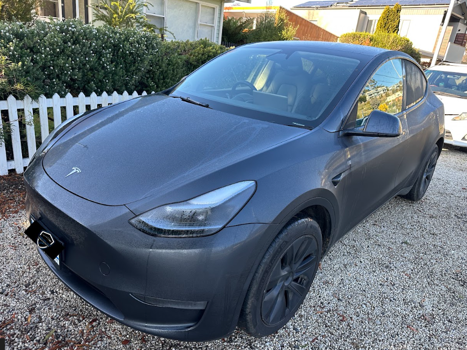 Before — Exterior Detail — Tesla exterior before and after a professional detail