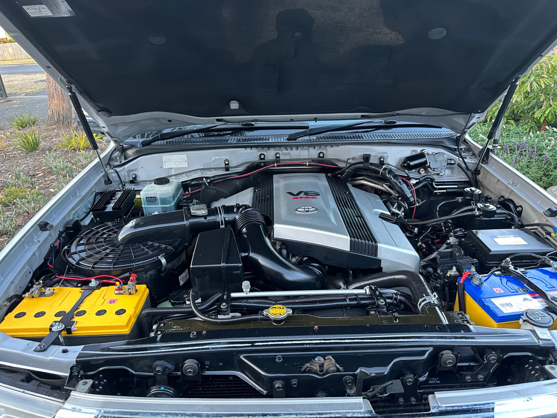 After — Toyota Land Cruiser V8 engine bay before and after a professional engine bay clean
