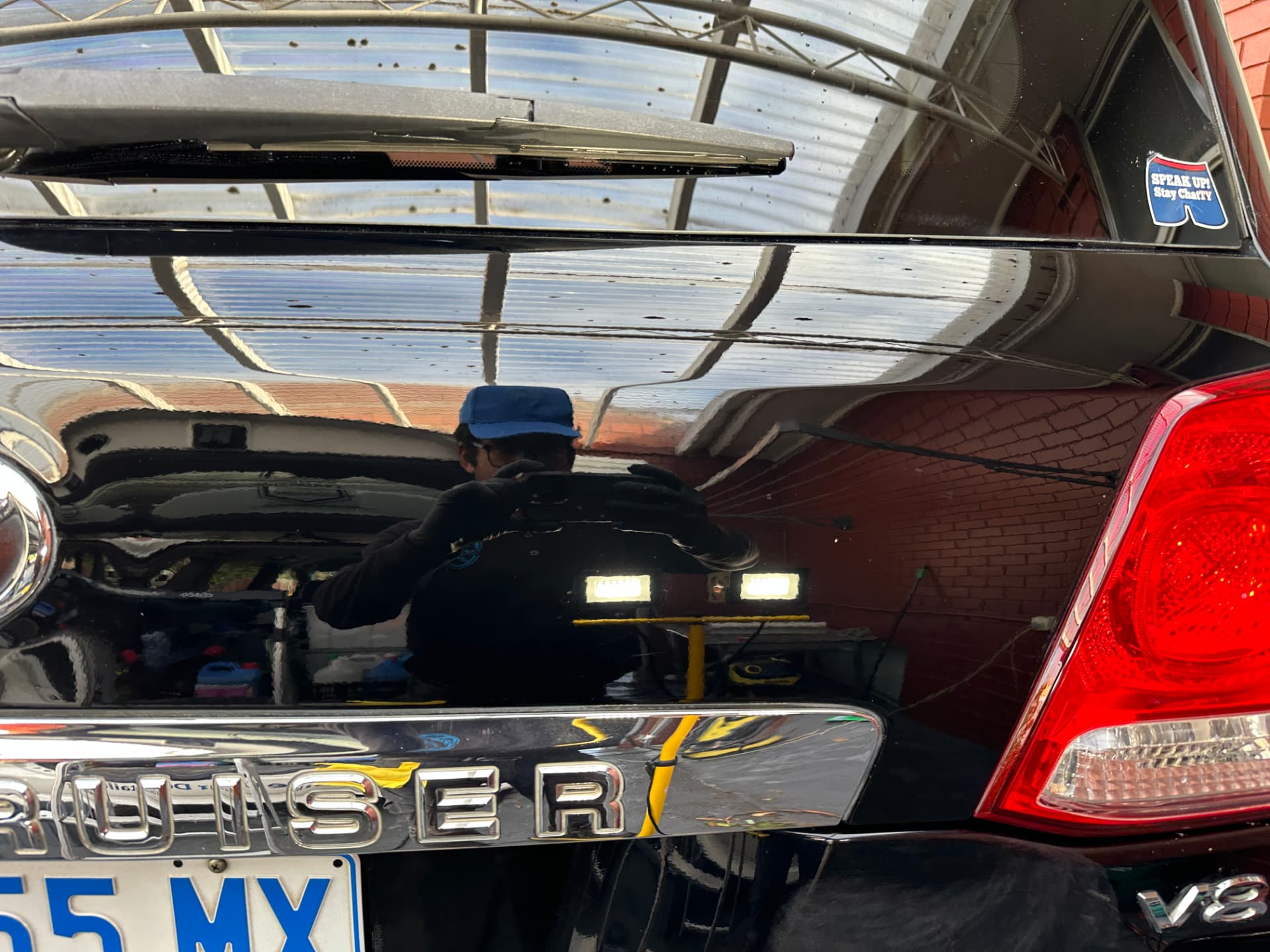After — Swirl marks removed from black Toyota paintwork after machine polishing
