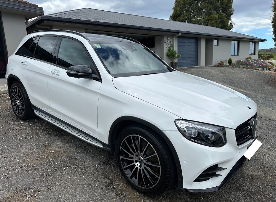 White Mercedes-Benz GLC SUV after a full mobile detail