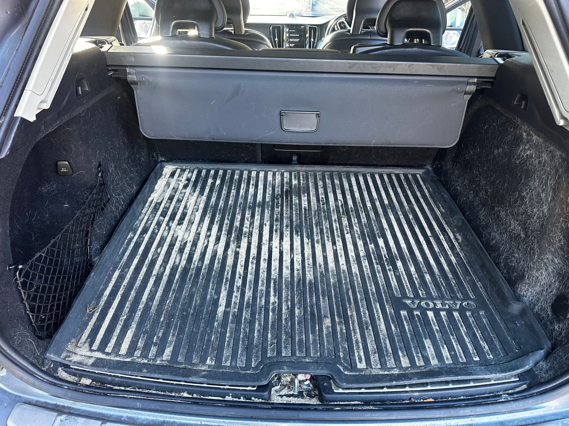 Before — Volvo XC60 boot and cargo liner before and after a deep clean