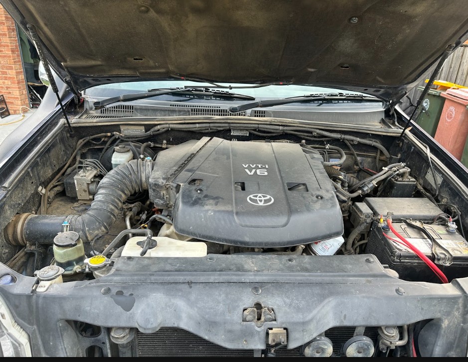 Before — Professional Engine Detailing — Detailed engine clean — engine bay degreased and dressed