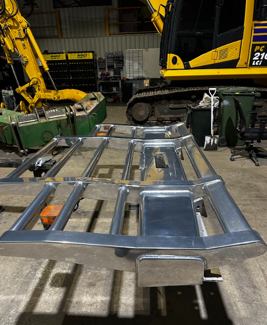After — Truck bullbar before and after a mirror metal polish