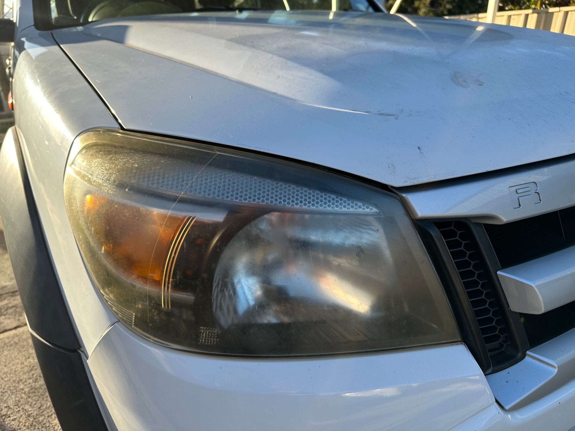 Before — Ford Ranger headlight before and after restoration